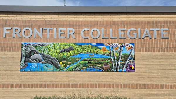 Mural on the outside wall of the high school building.